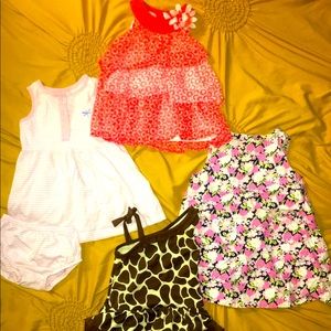 12-18 month dresses and bathing suit.